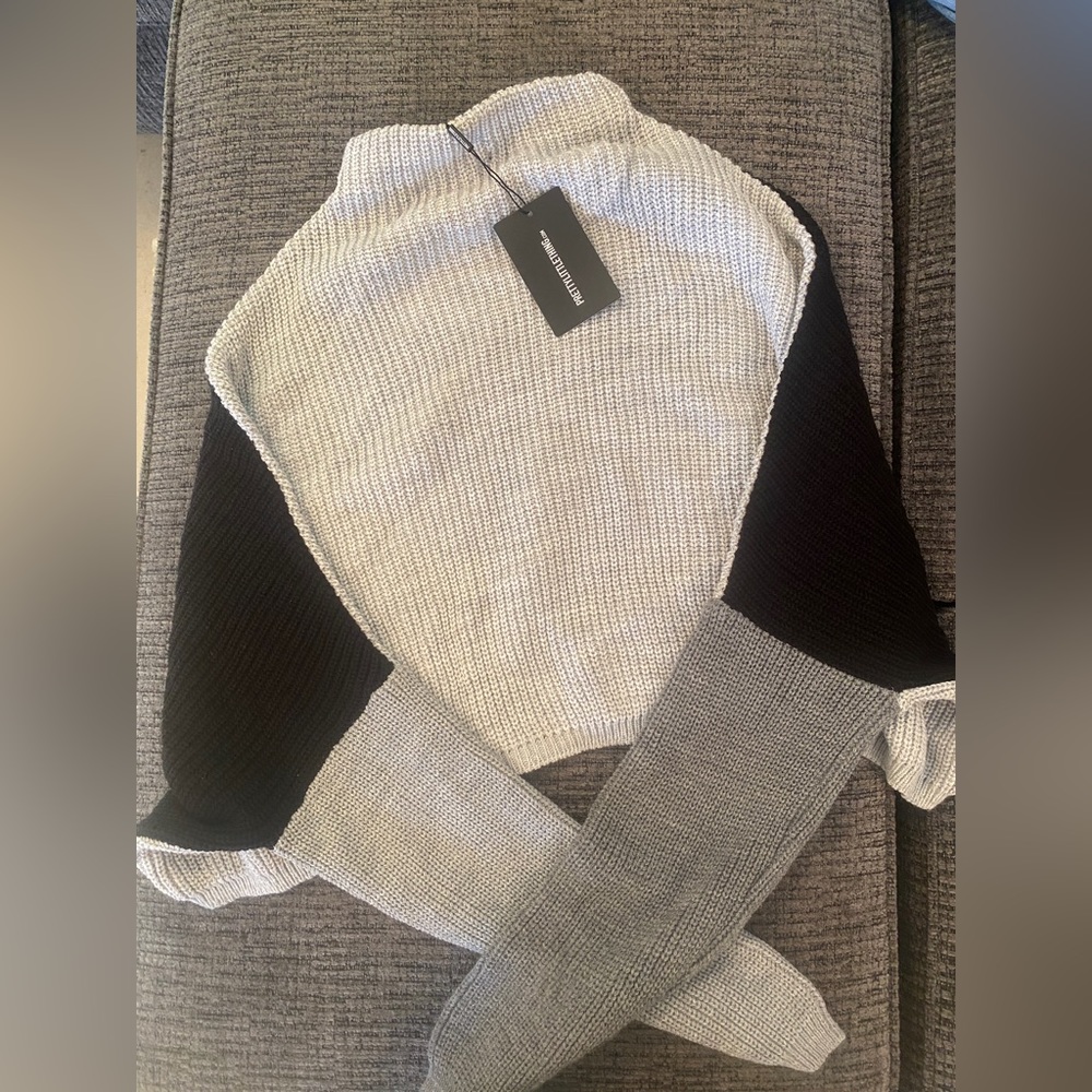 Over sized sweater. Great quality and super cute.